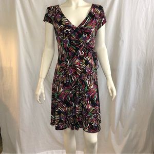 Woman’s faux wrap patterned dress size small 8